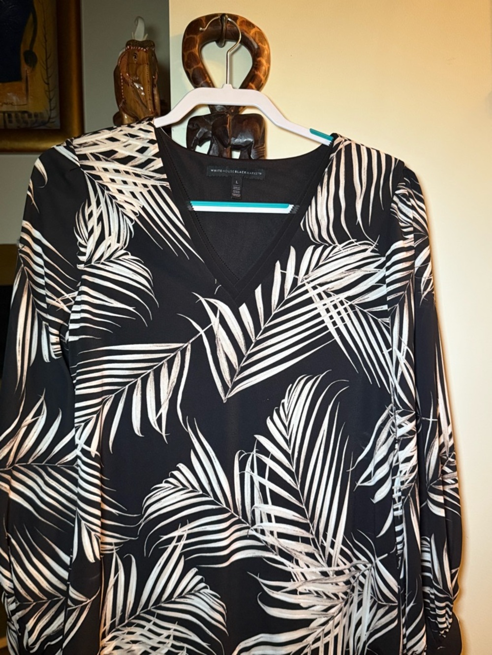 White House black market palm top